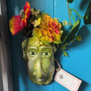 Green Face Wall Planter with Colorful Flowers